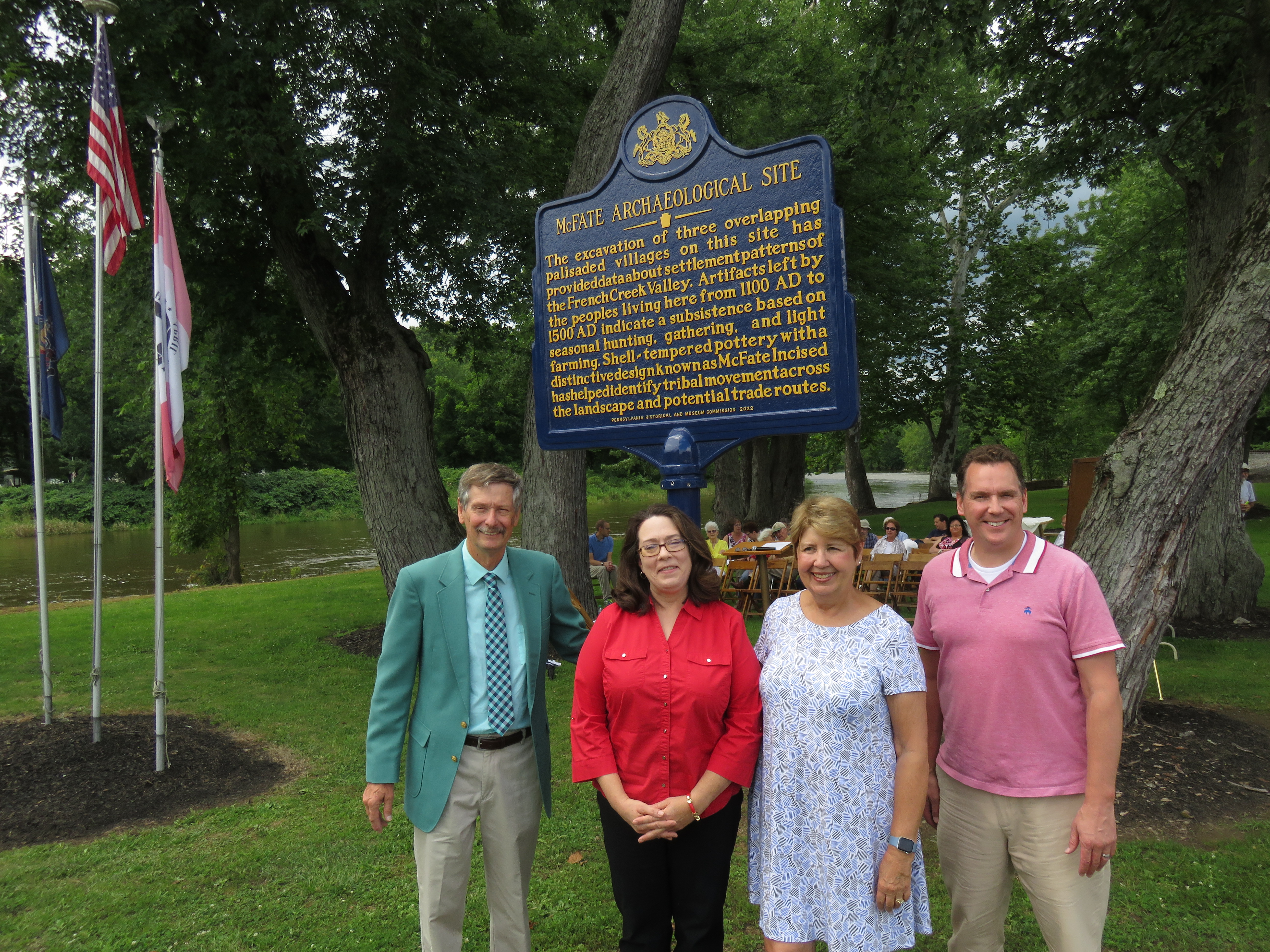 (From left to right) Borough of Cochranton Mayor Mark Roche, Senator John Heinz History Center Senior Curator Leslie Przybylek, Cochranton Area Redevelopment Effort President Marsha Rynd and Rep. Parke Wentling pose with the Pennsylvania Historical and Museum Commission marker detailing the McFate Archaeological Site. 